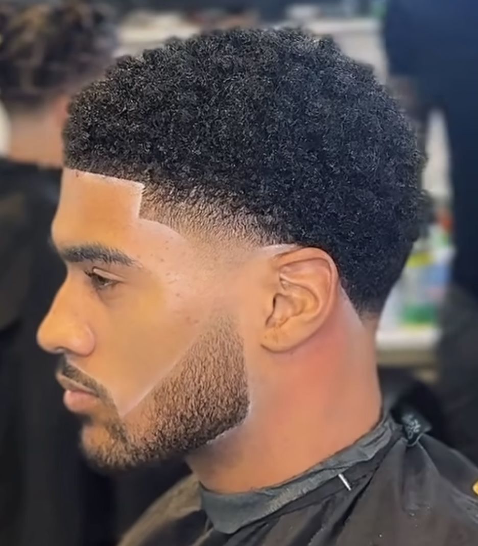 Coupe afro homme dégradé