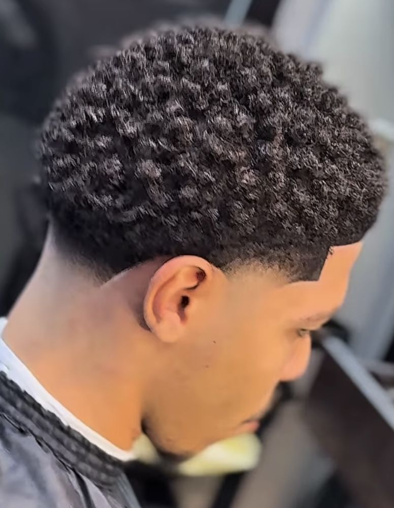 Coupe afro homme dégradé