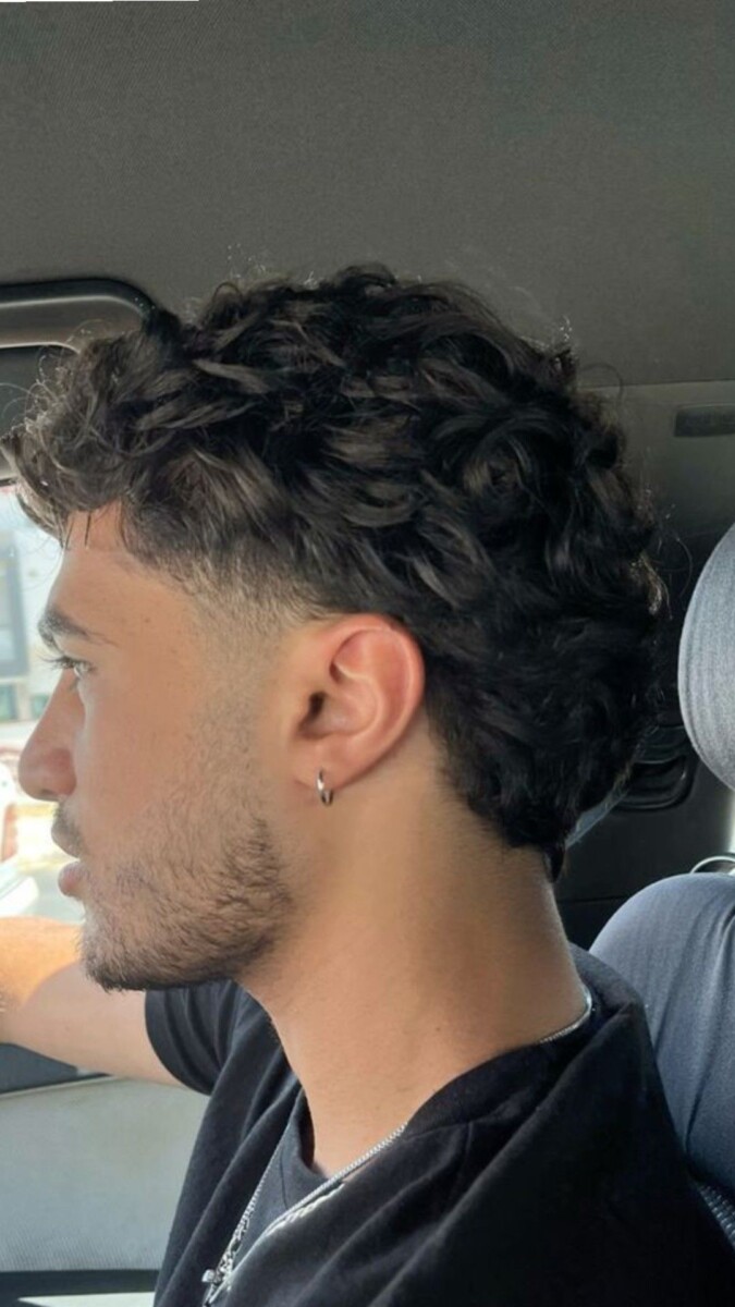 Cheveux bouclés homme dégradé